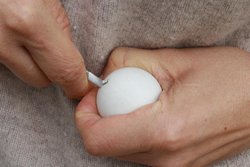 Making a whole in table tennis ball