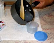 Pouring the corn starch into a container