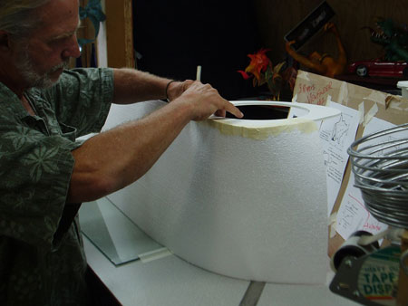 Shaping and Taping 1/16 inch foam panels around eye openings.