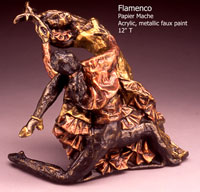 Flamenco - At only 14 inches tall, my bronze foundry thought it was a cast bronze when I took it in for a mould estimate!  It is printed newsprint papier mache with an aluminum foil armature. I shaped, dried, carved and shaped some more for the detail. The finish is acrylic metallics tinted with coloured metallics to highlight the colour for a natural patina look.  Red to copper and bronze metallic for the male and hansa yellow to the gold in the womans dress.