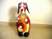 a dog on a bottle by Rina Ofir