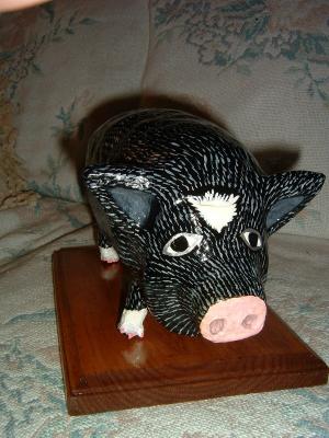 "Piggy "Patches" On wooden Base" by Carolyn Bispels