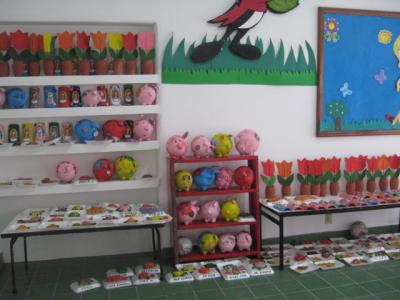 "Paper Maché Tulips and Pigs bank" by Ana Isabel Martí­n del Campo