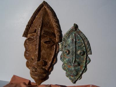"Two tribal masks" by David Peterson