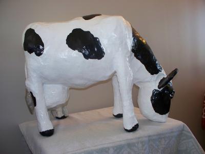 "Grazing Cow" by Cliff Powlowski