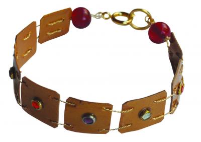 "Knights bracelet, studded with colored gemstones," by Minna Ben-Nun
