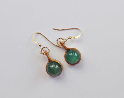 "Recycled paper gold earrings with inlay of turquoise stones" by Minna Ben-Nun