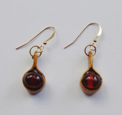 "Recycled paper gold earrings with red stones" by Minna Ben-Nun