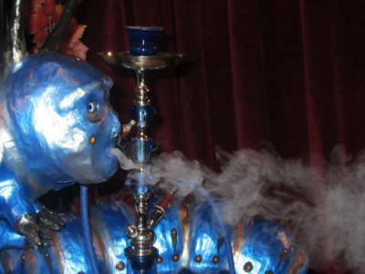 "Caterpillar at the "Alice in Wonderland" Party, Smoking His Hookah" by Karen Stix