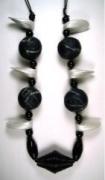 papier mache and onyx necklace by Evangeline Duplessis
