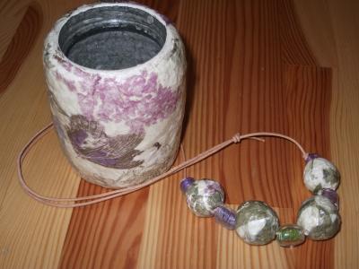 "Floral necklace and pot" by Catherine Kirkwood