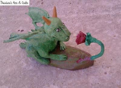 "Baby Dragon Smelling Flower" by Theodora Spanides