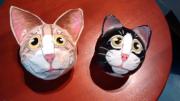 Cat head Christmas balls by Marilyn Kalbhenn