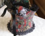 Skulls and roses papier mache corset by Sara Hall