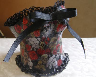 "Skulls and roses papier mache corset" by Sara Hall