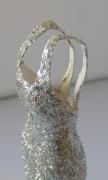 Silver papier mache dress by Sara Hall